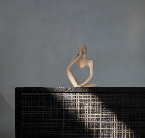 Buaja sideboards close up with a statue on top